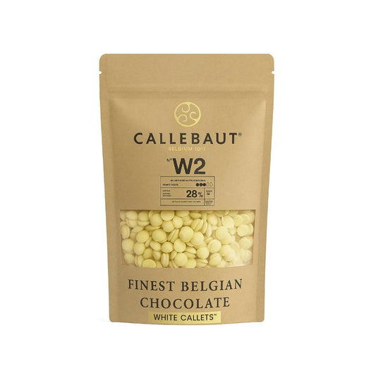 A stand-up kraft paper pouch of Callebaut W2 Finest Belgian Chocolate White Callets, featuring a clear window displaying the pale yellow chocolate pieces inside.