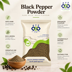 A bag of ATF All Things Food by Sea Black Pepper Powder is displayed on a light marble surface with a small wooden bowl of loose peppercorns. The image is a promotional graphic with text callouts on both sides highlighting product benefits, and the ATF logo at the top right.