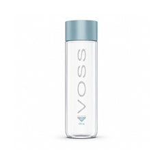 A 500 ml clear glass water bottle with a metallic light blue cap, featuring the brand name 'VOSS' printed vertically in gray on the front.