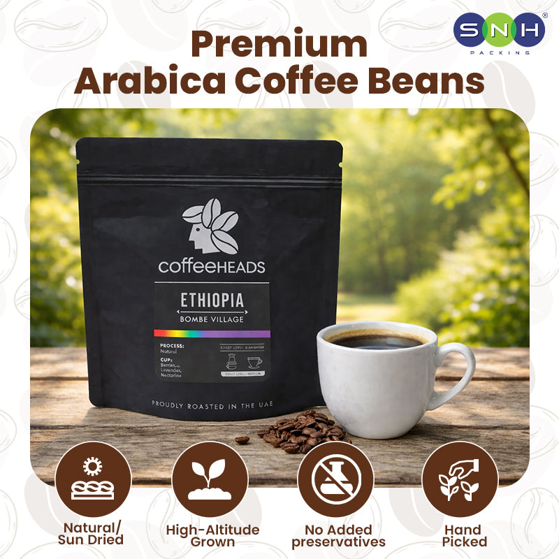 Coffee package with a cup of coffee on a wooden surface, featuring 'CoffeeHeads' brand.