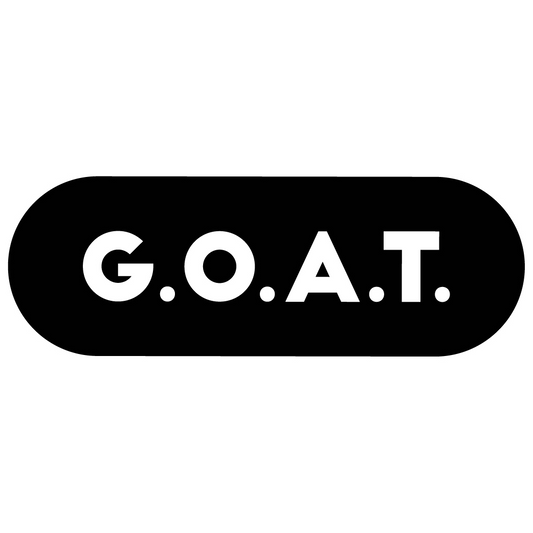 Black oval with 'G.O.A.T.' text on a white background