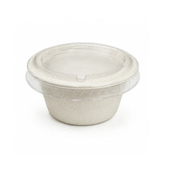 A small round disposable plastic food container with a clear lid, shown on a plain white background.