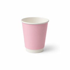 A single pink paper cup with a white interior and white rim