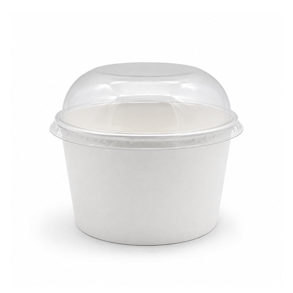 A white paper food container with a clear plastic dome lid