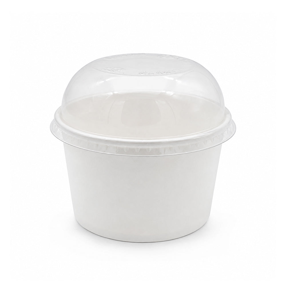 A white plastic food container with a clear plastic dome lid