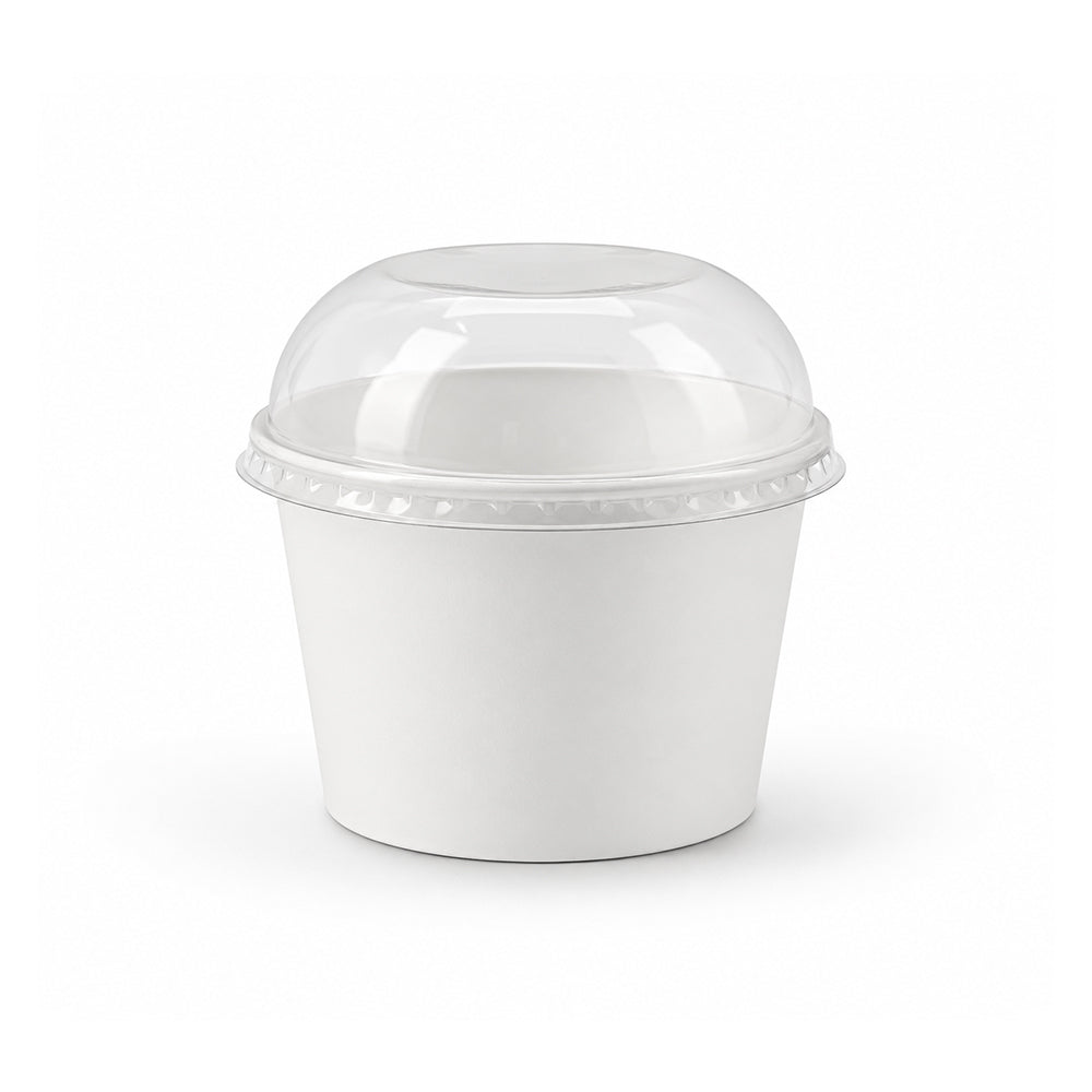 A white paper food container with a clear plastic dome lid