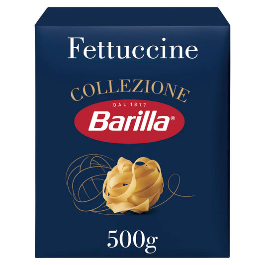 A 500g box of Barilla Fettuccine Collezione pasta, featuring a dark navy blue box with gold and white text and a graphic of a golden-yellow flatbread knot.