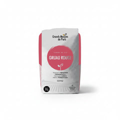 Bag of Grands Moulins de Paris Gruau Rouge flour on a white background