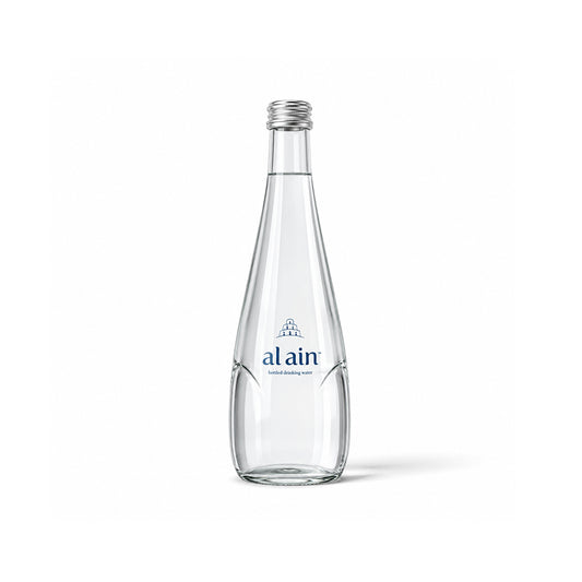 A clear glass water bottle with a silver screw cap and a blue printed 'alain' logo on the front