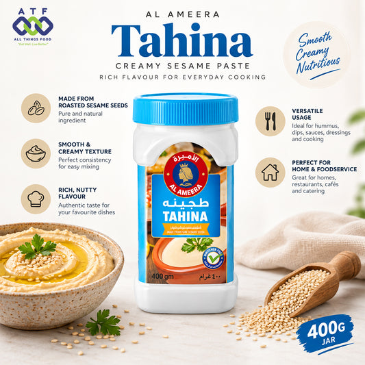A 400g jar of Al Ameera Tahina Creamy Sesame Paste centered with food styling props including hummus, sesame seeds, and a spoon. The image includes marketing text and icons describing the product benefits, with the ATF All Foods Food logo in the top left.