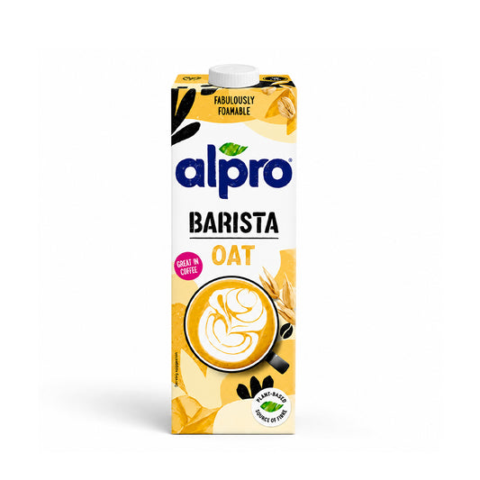 Alpro Barista Oat milk carton with a white cap, featuring a white and yellow label with coffee and oat illustrations.