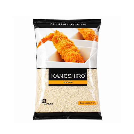 A 1 kg bag of Kaneshiro Premium rice snack, featuring a clear lower section showing the white rice grains inside, with a black and white top section displaying a golden fried shrimp snack.