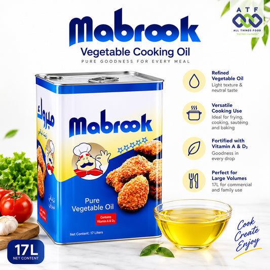 Mabrook Pure Vegetable Oil 17L metal tin packaging shown with promotional text, a glass of golden oil, and food props including tomatoes, garlic, and green leaves.
