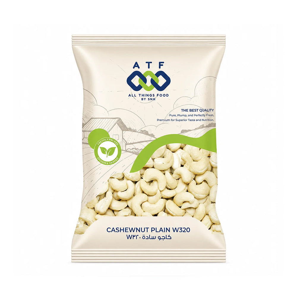 A package of ATF All Things Food by ATF Cashewnut Plain W320, featuring a cream-colored bag with a clear window showing the plain cashews inside, and green and blue branding details.