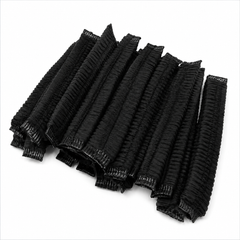 A set of black ribbed elastic hair extension bands arranged in a fan shape on a plain white background.