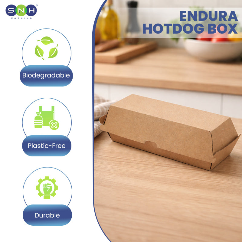 Endura hotdog box on a kitchen counter with biodegradable, plastic-free, and durable features highlighted.
