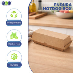 Endura hotdog box on a kitchen counter with biodegradable, plastic-free, and durable features highlighted.