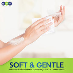 Person applying a product to their arm with a focus on 'Soft & Gentle' text and SNH branding.