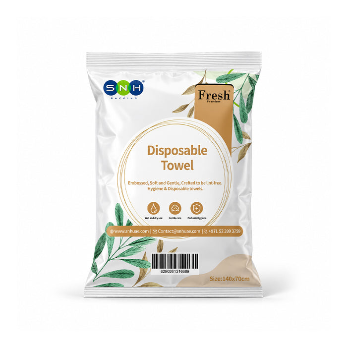 A package of SNH Fresh Disposable Towels, featuring a white and gold foil bag with green leaf illustrations and the SNH logo.