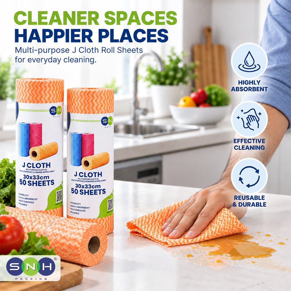 Two rolls of orange chevron-patterned J Cloth roll sheets displayed on a kitchen countertop next to a person's arm and hand wiping a spill, with promotional text and feature icons on the right.