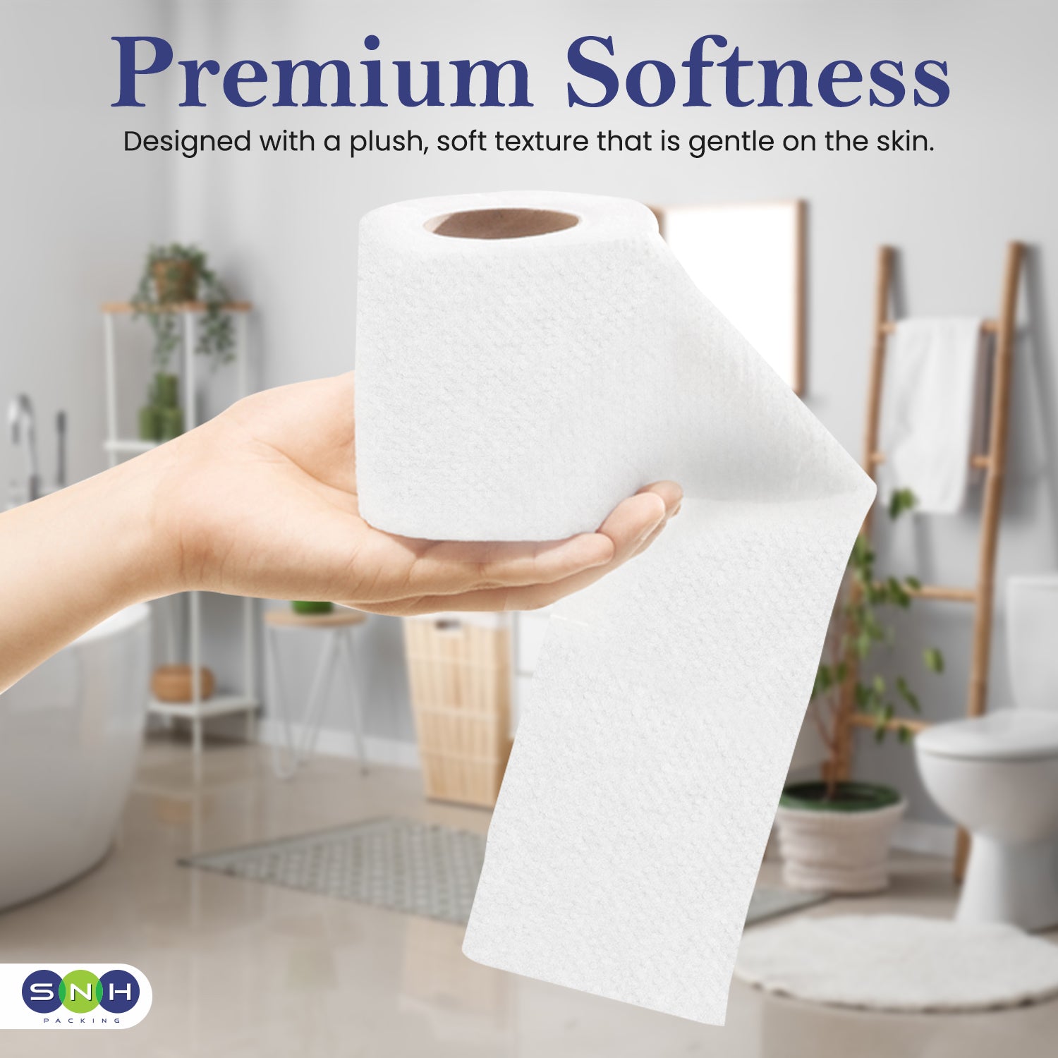 Hand holding a roll of white paper towel with 'Premium Softness' text in a bathroom setting.