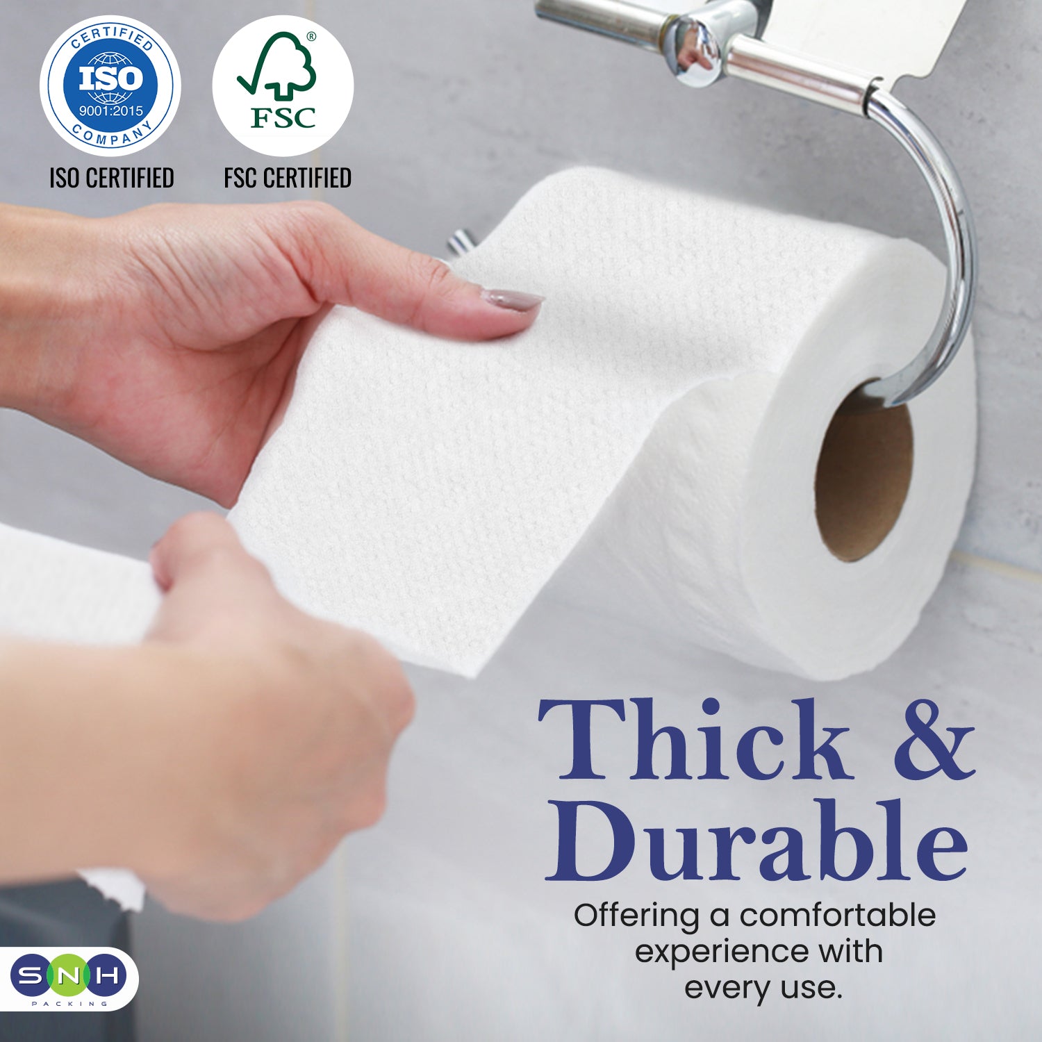 Roll of thick and durable toilet paper with ISO and FSC certification logos, and a hand holding the paper.